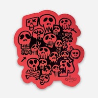 a red sticker with skulls on it